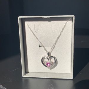 Heart pendant with a pink stone